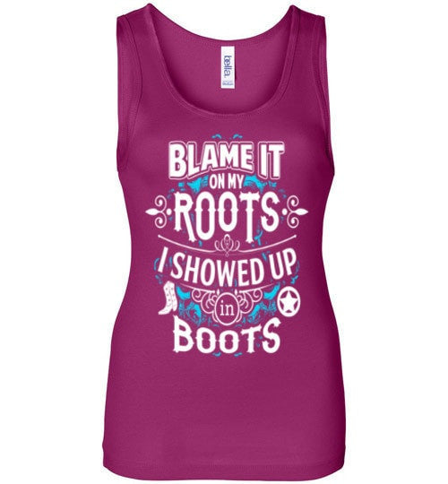 BLAME IT ON MY ROOTS I SHOWED UP IN BOOTS